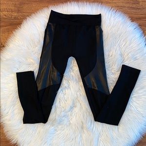 Black leggings with leather like sides